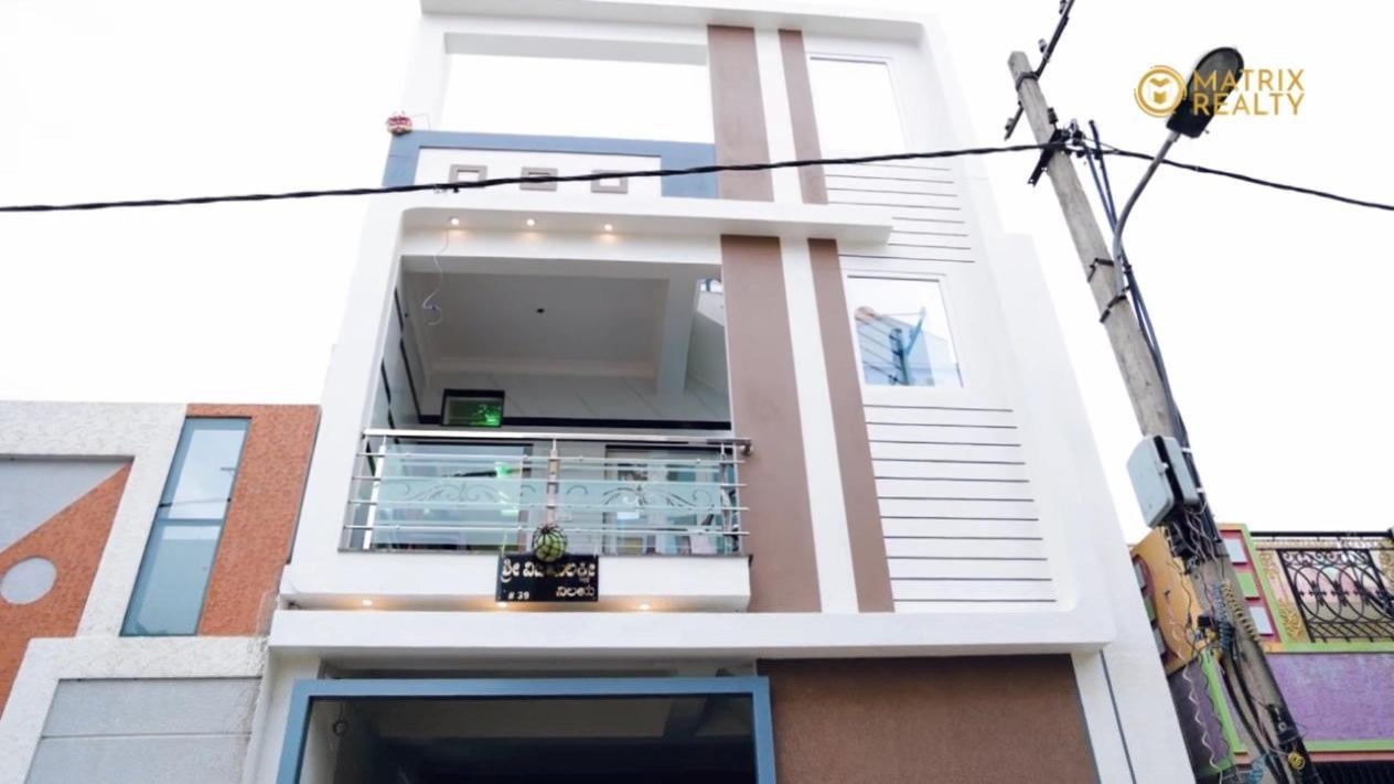 Front elevation of an independent house at 8th Mile, Bengaluru built by Matrix Realty
